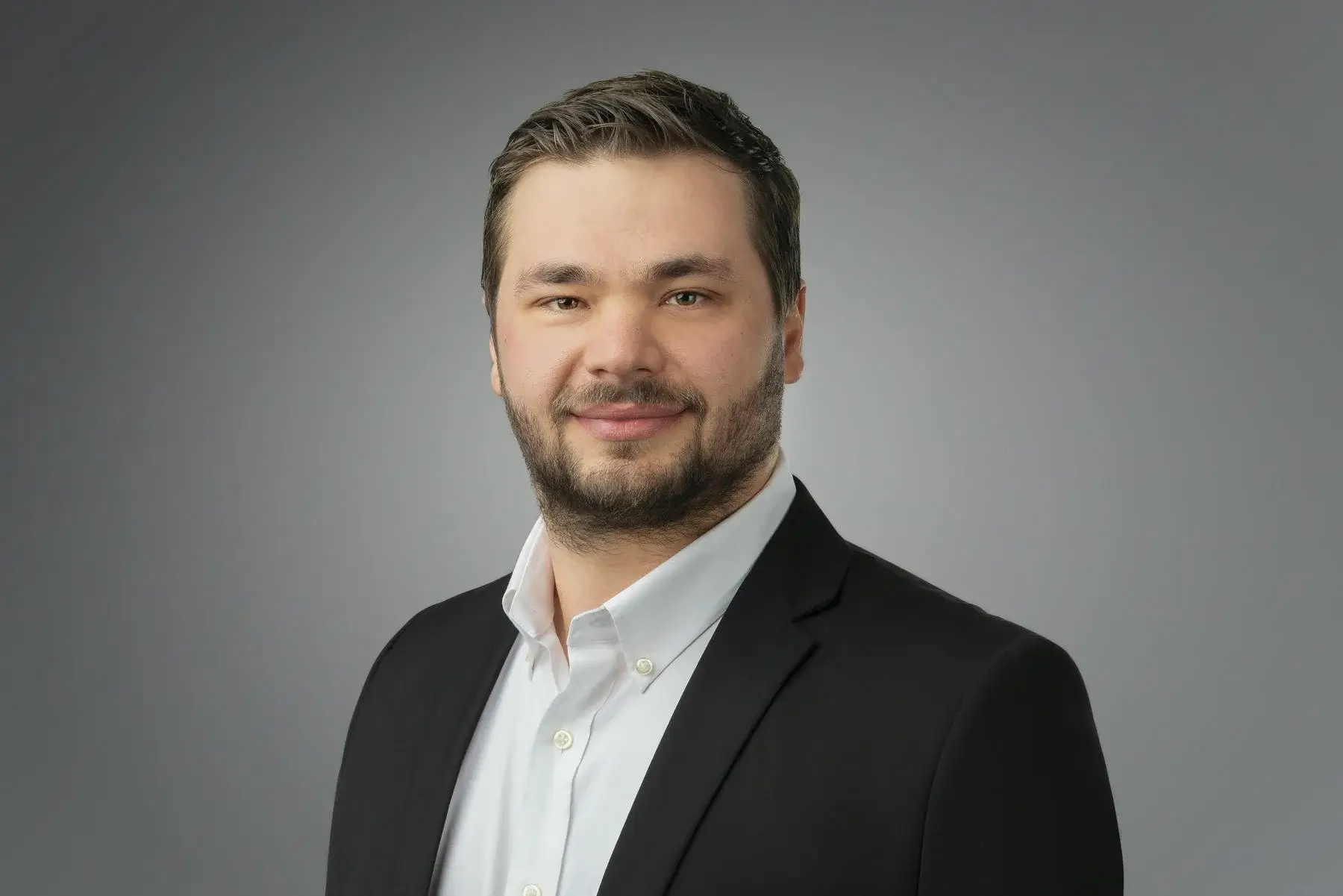 Aleks Kazadayev headshot