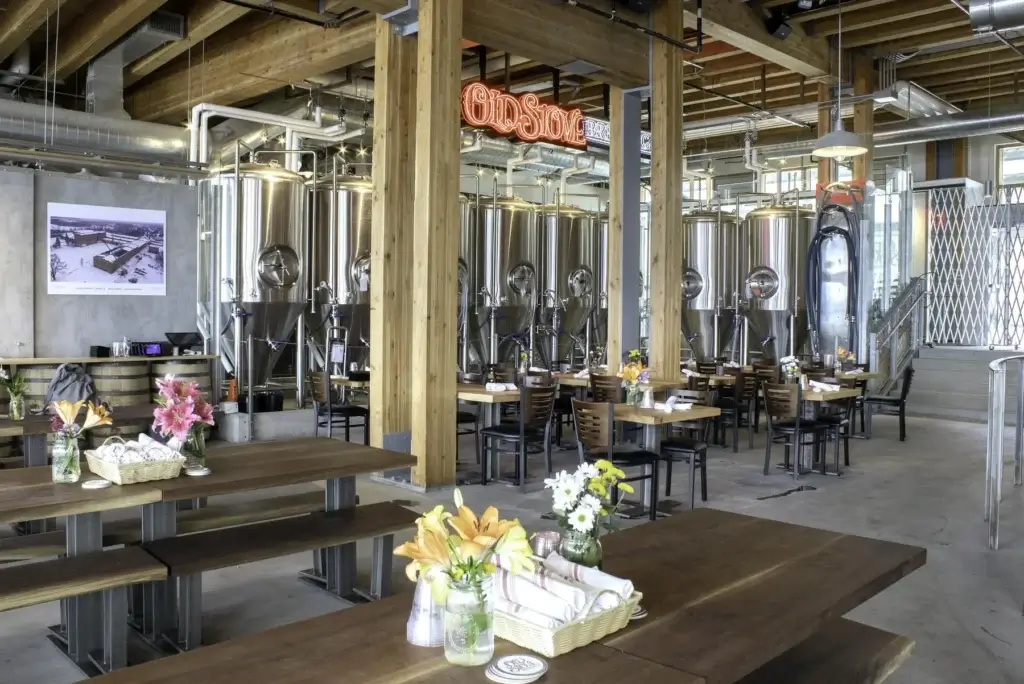 Interior of Old Stove Brewing dining room and brewing tanks