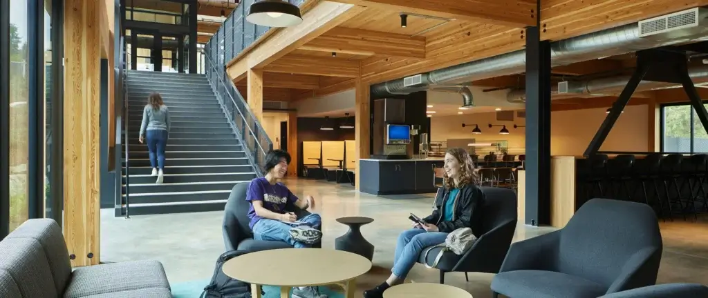 University of Washington Bothell Residential Village interior with students on couches