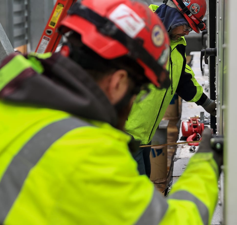 Auburn Mechanical employees working on jobsite