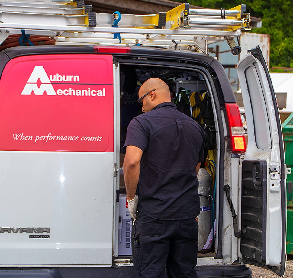 Auburn Mechanical service division employee with van